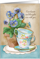 Our hearts are with you sympathy card with flowers and teacups. card