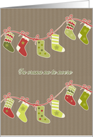 Merry Christmas in Tahitian, stockings, kraft paper effect card