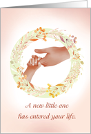Congratulations on Becoming an Aunt Holding Baby Hand in Floral Wreath card