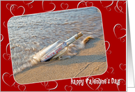 Valentine I Love You message in a bottle on heart background card