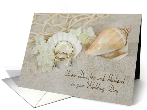 Daughter's wedding, rings in beach sand with seashells and net card