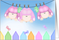 birth announcement of triplet girls hanging on clothesline card