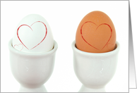 Anniversary red hearts on hard boiled eggs in white cups card