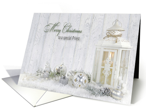Priest's Christmas white candle lantern with ornaments in snow card