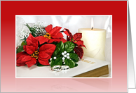 Christmas wedding-poinsettia and ring on Holy Bible with candle card