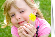 Friendship-ladybug on little girl’s finger with dandelion card
