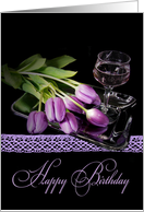 Birthday glass of wine and purple tulips on silver tray card