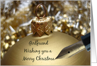 Girlfriend christmas greeting - fountain pen writing christmas message on golden ornament card
