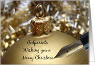 Godparents christmas greeting - fountain pen writing christmas message on golden ornament card