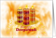 Diwali Greetings with Three Colorful Candles on golden orange card