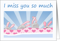 Miss you bunnies in bed.homesick, for parents card