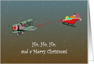 Female Pilot In Biplane Towing Santa In His Sleigh card