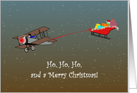 Male Pilot In Biplane Towing Santa In His Sleigh card