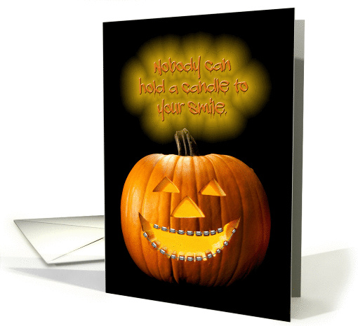 Pumpkin Wearing Braces on Teeth Hold Candle Funny Halloween card