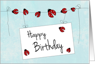 Ladybugs on Line with Sign for Happy Birthday card