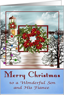 Christmas to Son and Fiance, snowy lighthouse scene on blue, wreath card