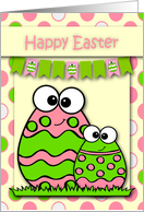 Easter, general. Two cute decorated eggs with a flag over their heads card