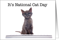 Smart computer kitten wearing glasses announcing National Cat Day card