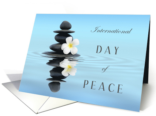 International Day of Peace with Calm Water Rock Stack and Flower card
