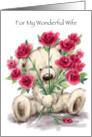Cute bear holding a bunch of roses for his wife for her birthday. card