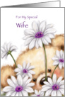 Cute furry bear holding beautiful flowers for wife’s birthday. card