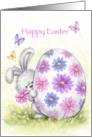 Cute rabbit with flower peeping around a big painted easter egg. card