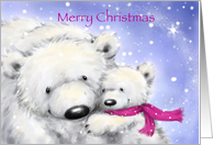 Polar cub nestling her mother in snow flakes for christmas time. card