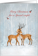 Dear couple cuddling in snowy wood,Merry Christmas for a couple card