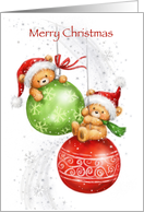 Two cute bears with Santa’s hat hanging on baubles, Merry Christmas card