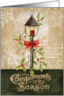 Holiday Lamp with Holly and Bow on Aged Background for the Holidays card