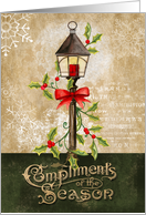 Holiday Lamp with Holly and Bow on Aged Background for the Holidays card