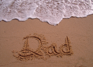 sand writting Dad...