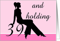 39 And Holding, female silhouette sitting on # 39 card
