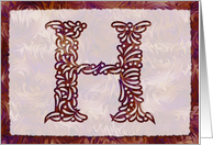 Ornamental Monogram ’H’ with warm red background card