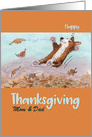 Happy Thanksgiving Mom & Dad, Corgi dog jumping in Autumn leaves card