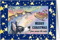 Merry Christmas from across the miles, Husky with Santa’s sleigh card