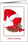 Season’s Greetings Santa hat on party cup with gingerbread man card