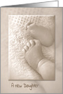 New Daughter Congratulations baby feet on soft blanket in sepia tone card