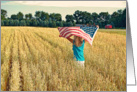 4th of July-girl in wheat field with American flag card