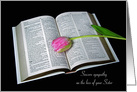 Loss of Sister pink tulip on open white Holy Bible on black card