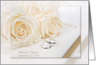 Wedding Rings and Roses on White Bible with Newlywed Names card