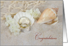 wedding congratulations-wedding rings in seashell with sand and net card