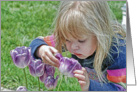 Inspirational card with little girl studying a purple tulip card