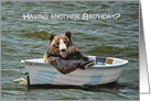 Humorous Birthday with smiling bear in dinghy on water card