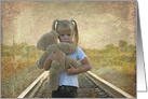 sad little girl with teddy bear on railroad tracks for Friendship card