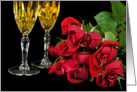 Valentine’s Day roses with champagne flutes on black card