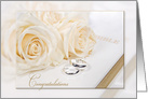 newlywed congratulations, white roses with wedding rings on Holy Bible card