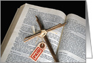 Easter cross on open Holy Bible with price tag card