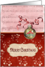 Merry Christmas-gold ornament on musical background card