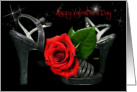 Valentine red rose with silver high heels on black. card